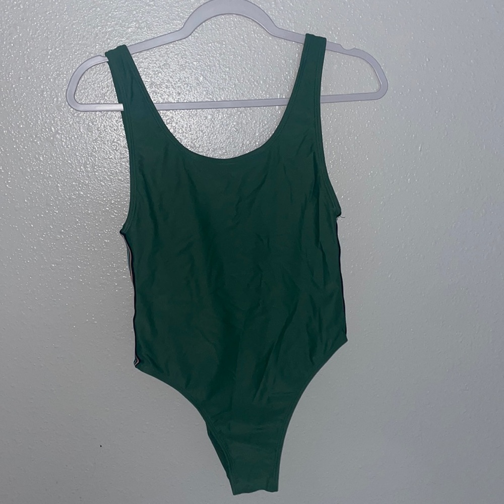 Green one piece bathing suit